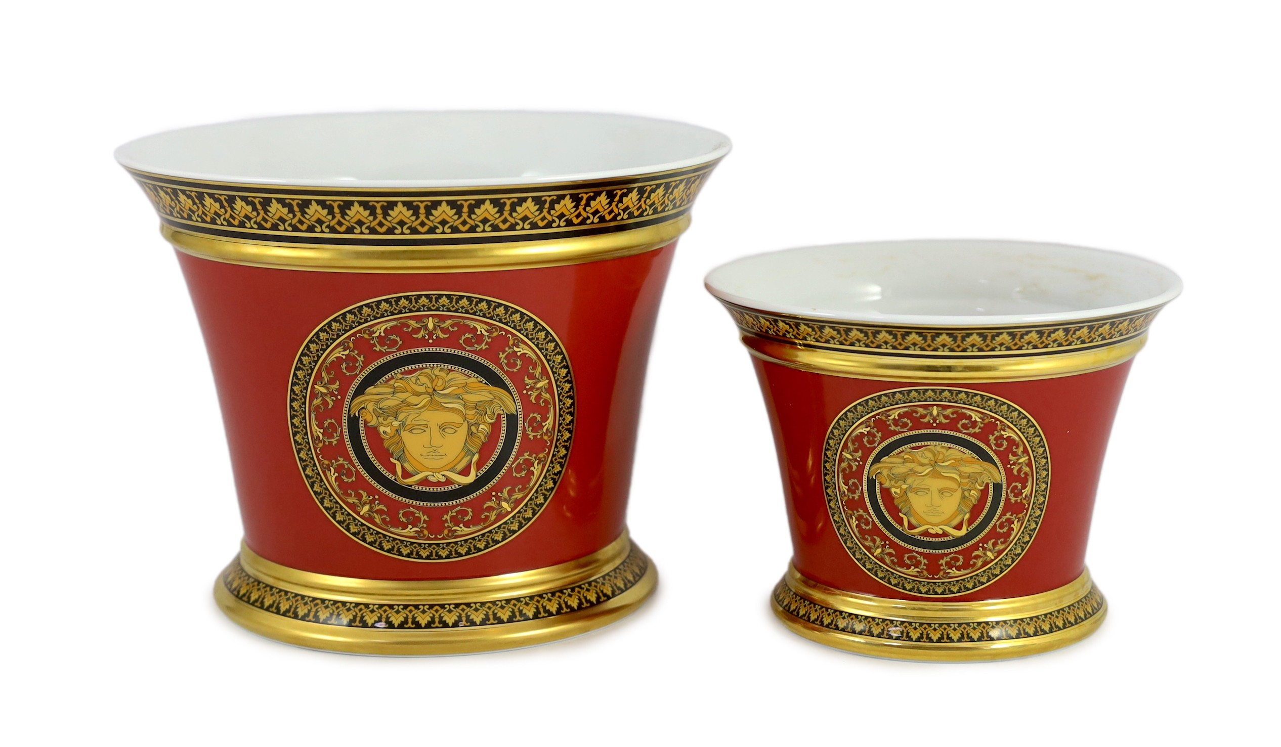Rosenthal for Versace. A graduated pair of Medusa pattern jardinieres, 19.5cm and 14.5cm high